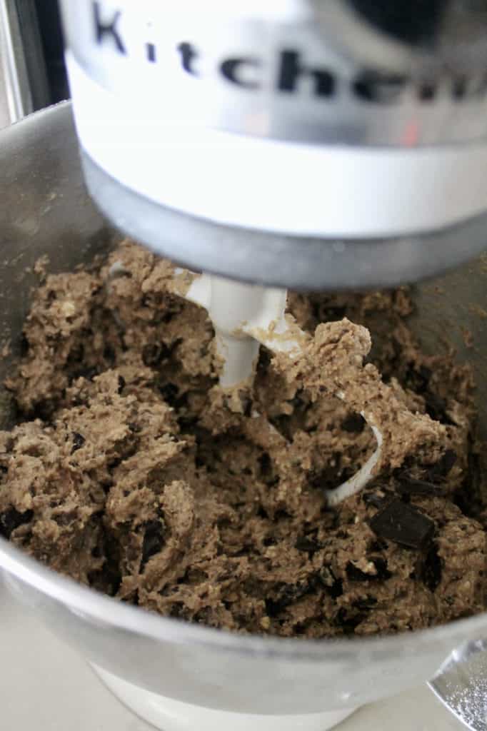 Mixer with dough for chocolate cookie recipe