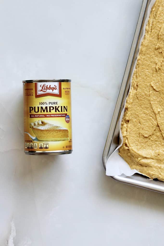 Can of pumpkin and cake batter in quarter sheet pan