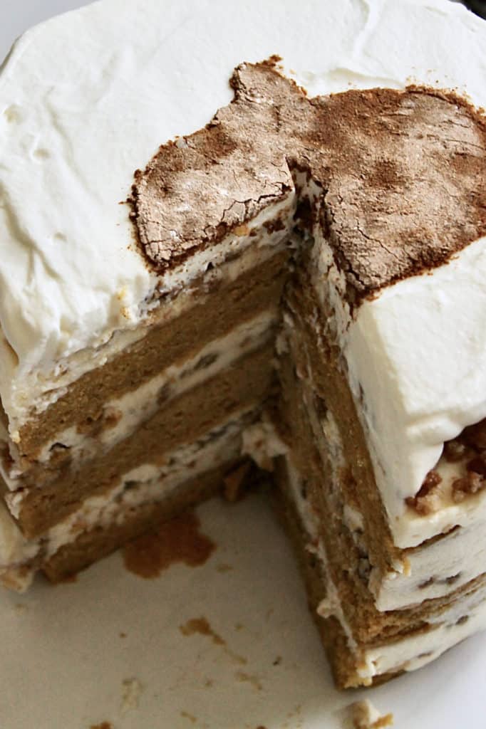 Overhead shot of pumpkin chai latte cake with pumpkin design