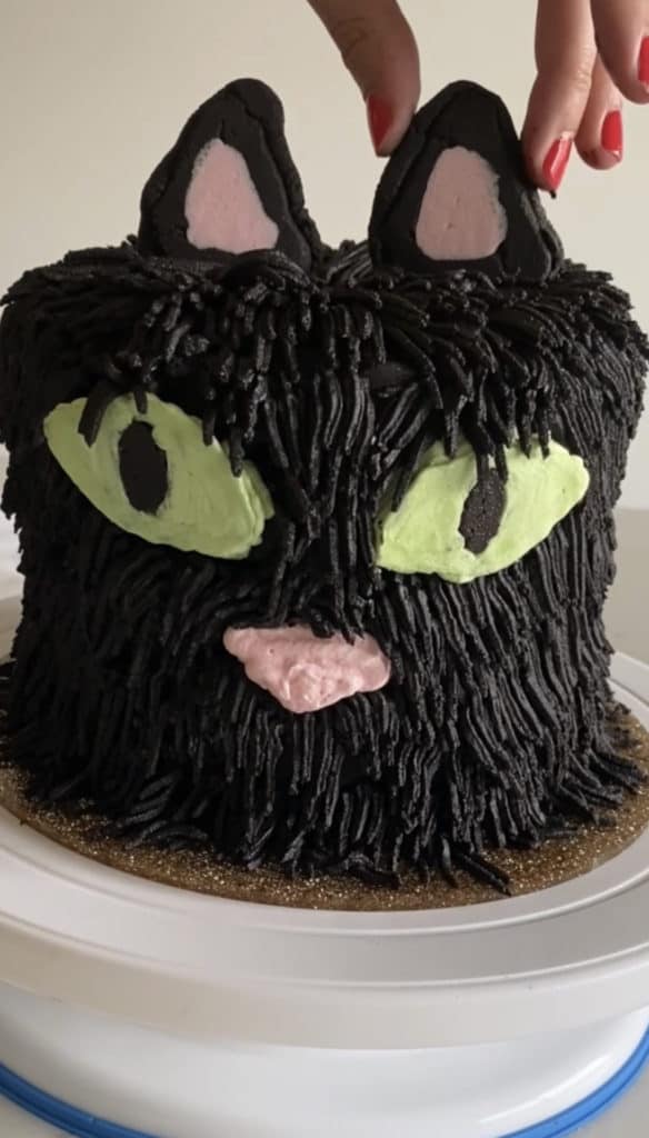 black buttercream ears for black cat cake design