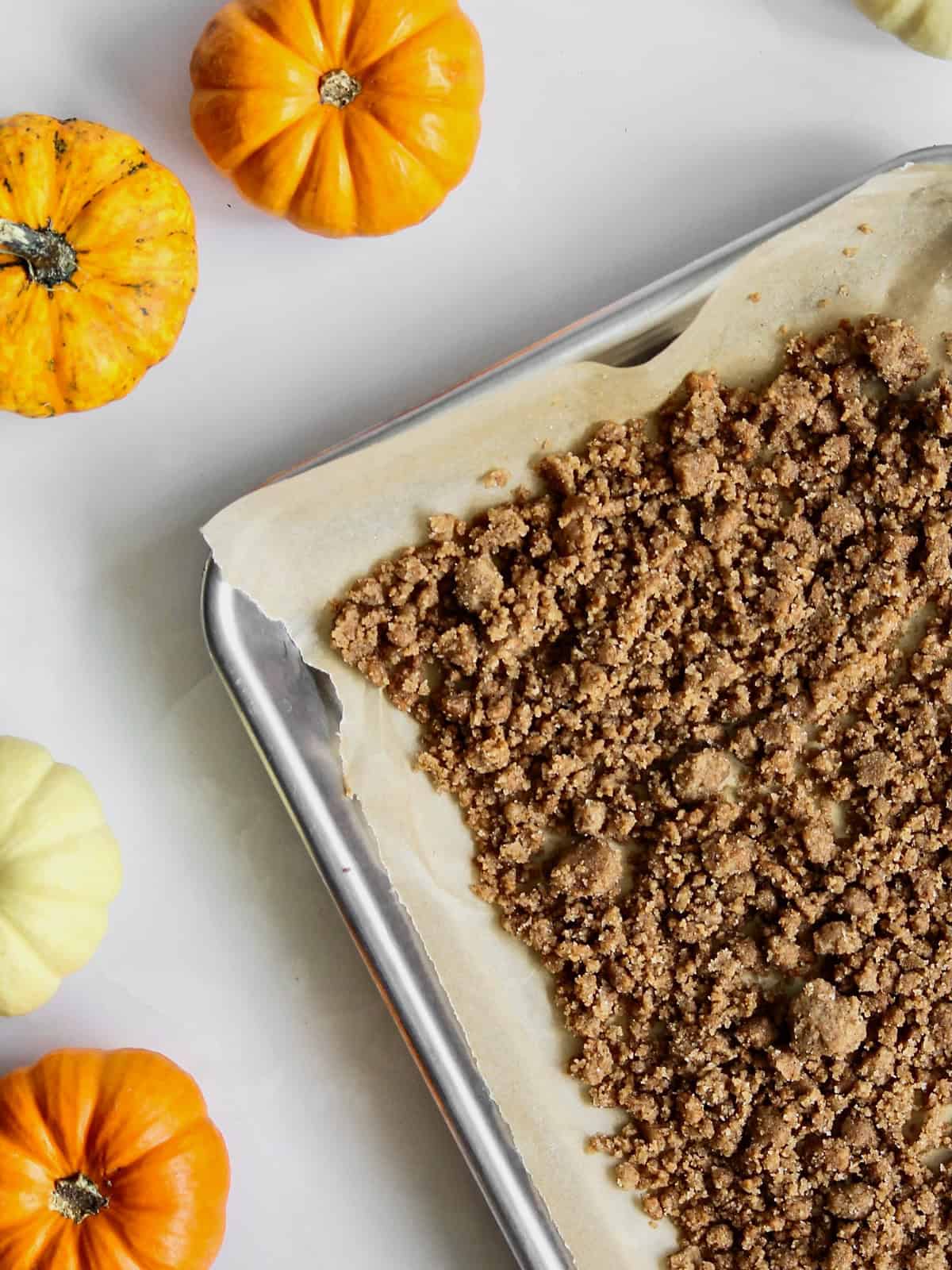 Baked Biscoff crumb on a baking sheet.