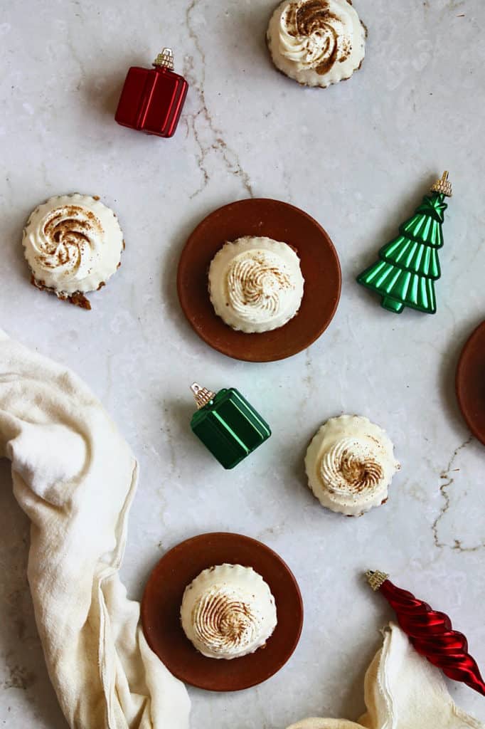 overhead shot of my no-bake mini eggnog pies surrounded by linen and Christmas tree ornaments