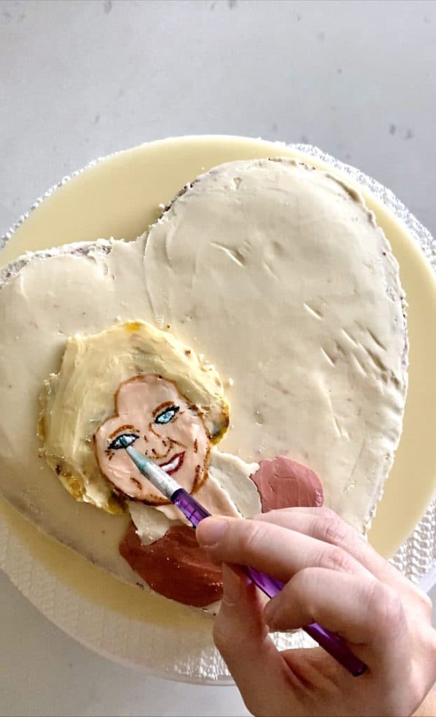 Painting Betty White's face on cake