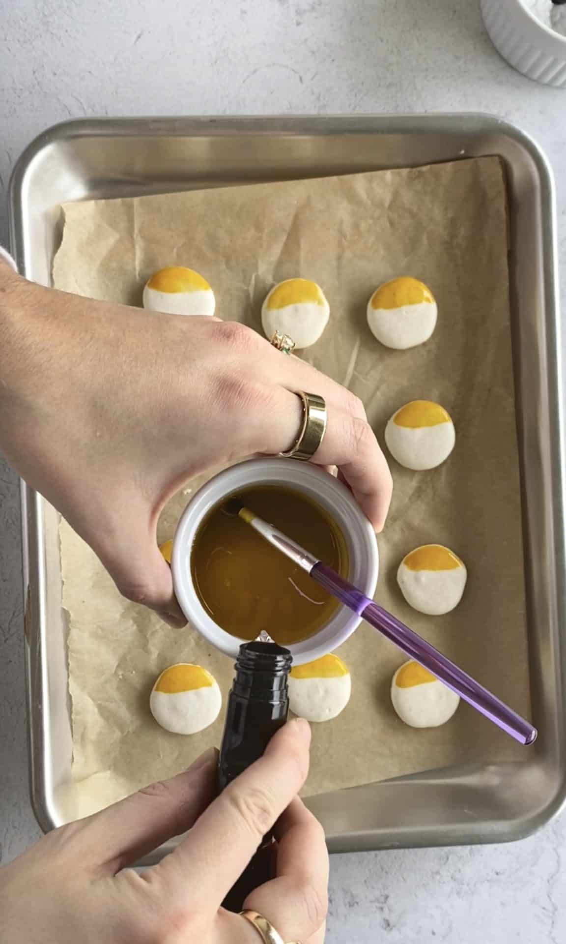 mixing food gel to create ombré hand painted macarons