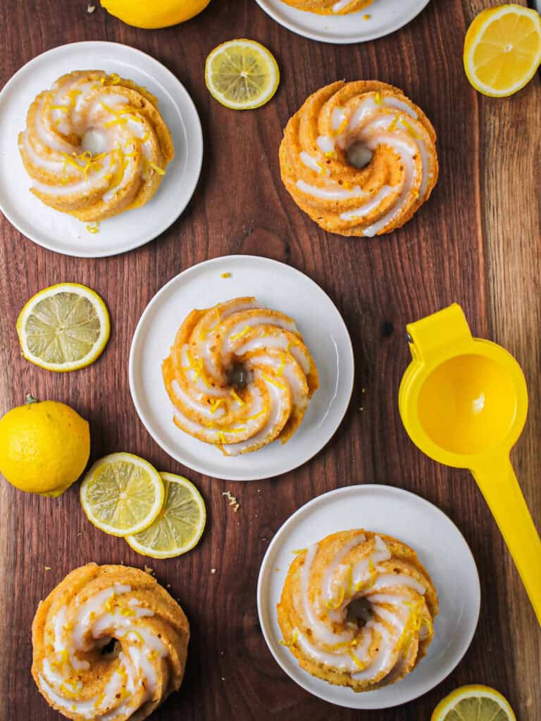 Overhead shot of 6 glazed lemon mini bundt cakes.