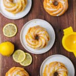 Mini lemon Bundt cakes glazed and garnished with lemon zest.
