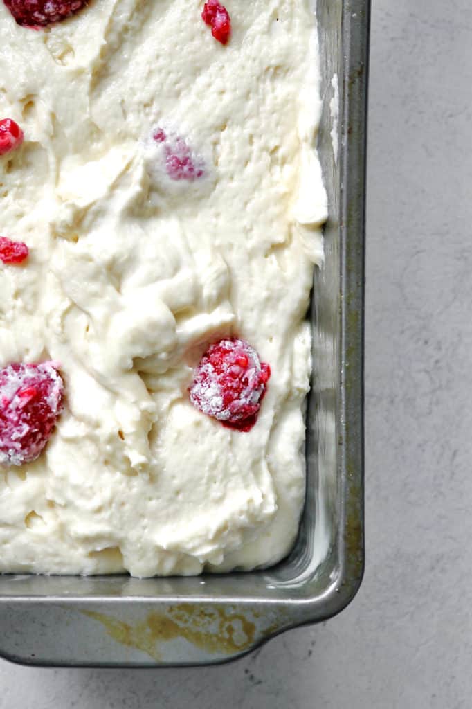 up close shot of raspberries in loaf cake