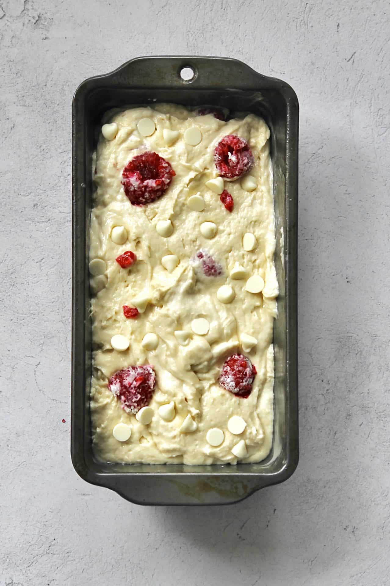 white chocolate and raspberries in loaf cake