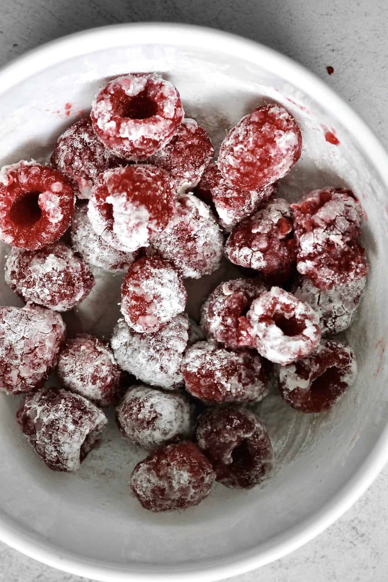 floured raspberries for loaf cake