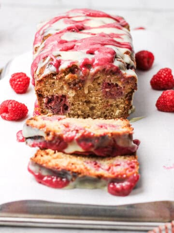 Hero shot of pink and white glazed loaf cake.