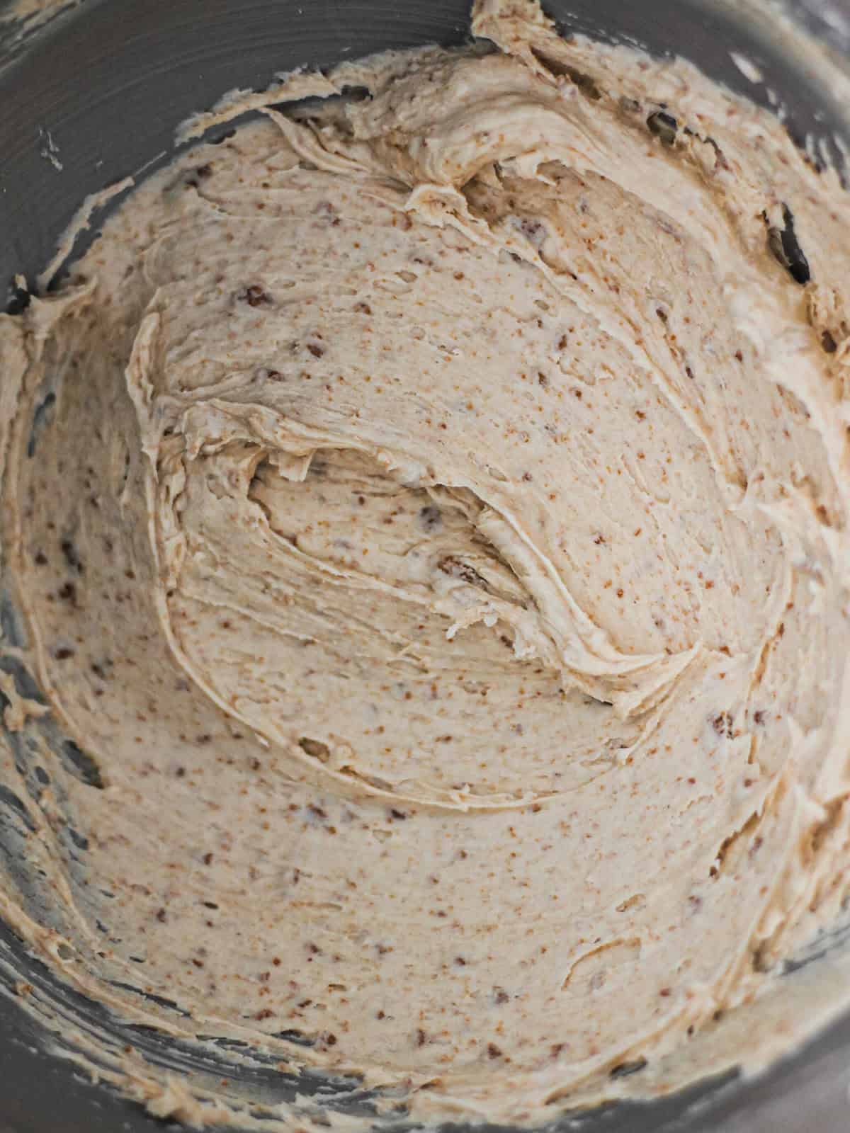 Mixing bowl of Biscoff buttercream frosting.