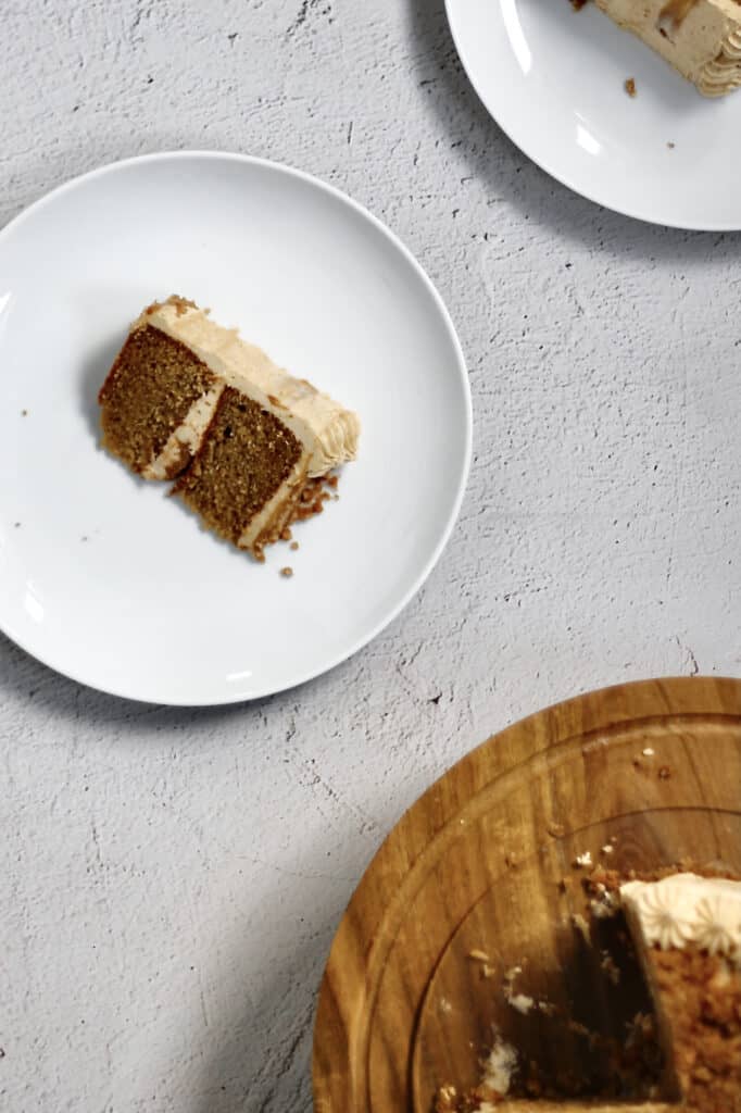 overhead image of a slice of cake next to cake stand