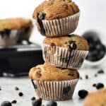 stack of three baked blueberry chocolate chip muffins using fresh blueberries