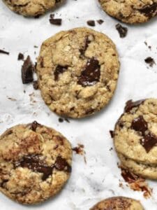 overhead image of baked chocolate chunk cookies on a baking sheet