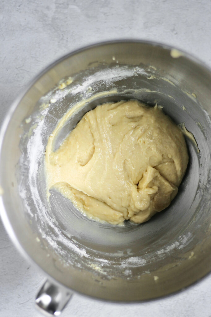 vanilla cupcake batter, which has been mixed in a bowl and is ready to be poured into cupcake liners

