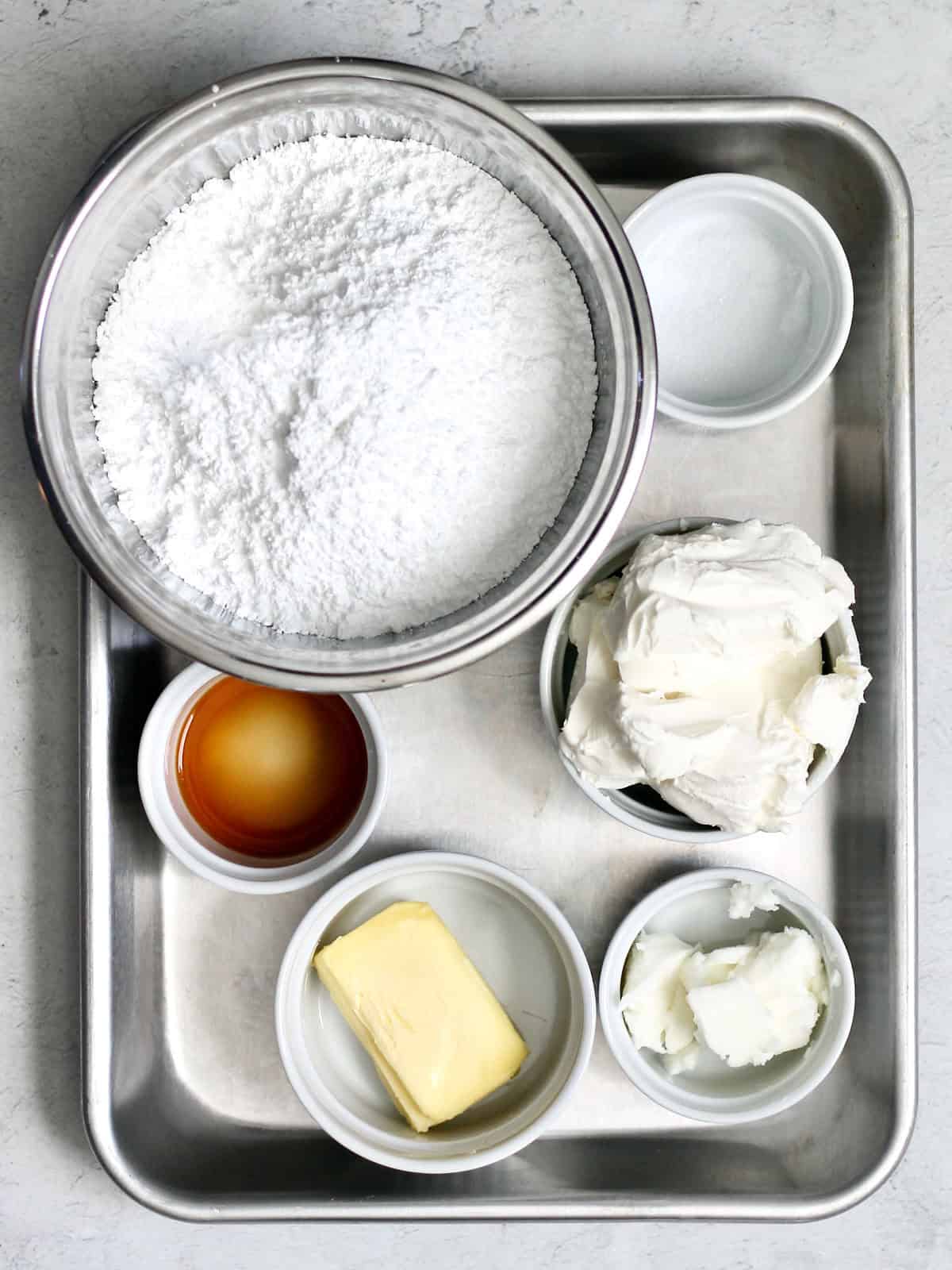 Cream cheese frosting ingredients for carrot cake.