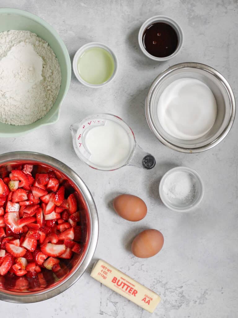 Overhead shot of ingredients for strawberry filled cupcakes.