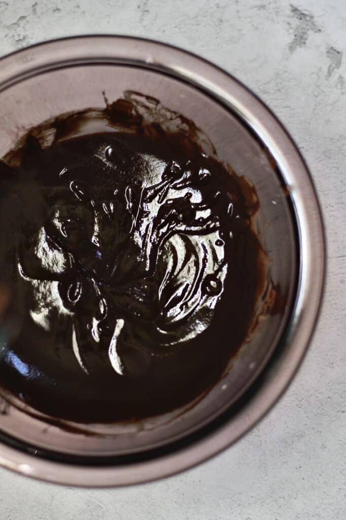 melted chocolate combined with heavy cream, super glossy chocolate