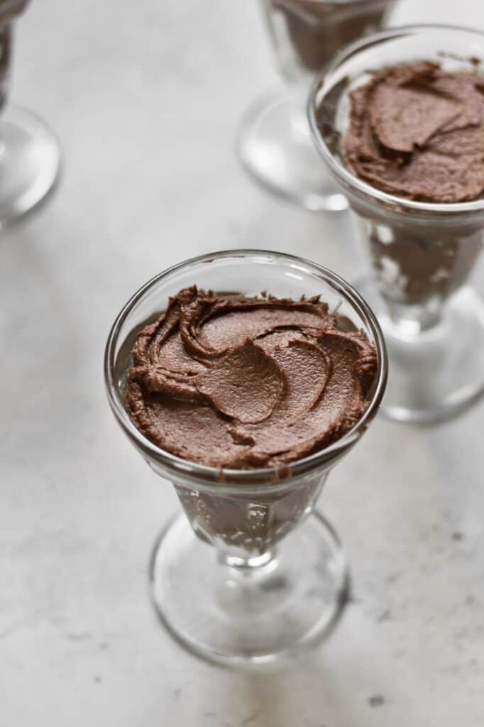 tall glasses with homemade chocolate mascarpone mousse in them