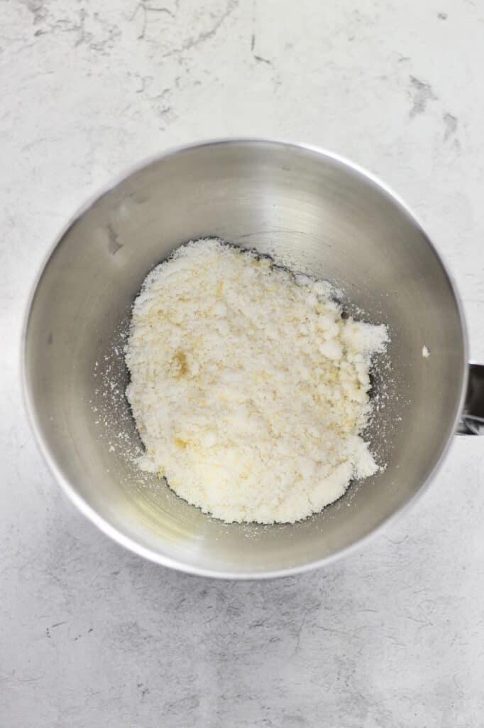 mixing bowl with sugar and lemon zest in it
