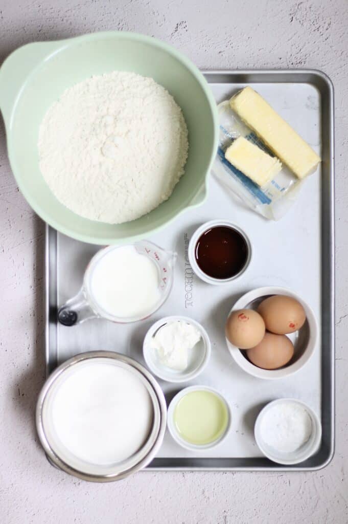 ingredients for vanilla cake with strawberry filling