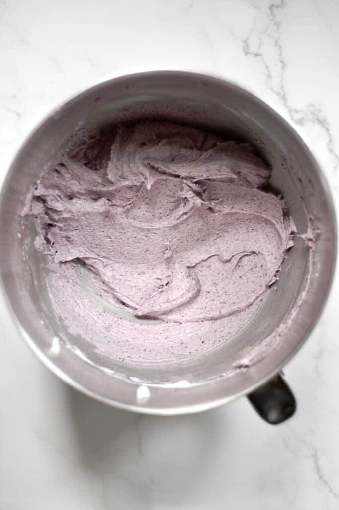 blueberry cake frosting in a mixing bowl