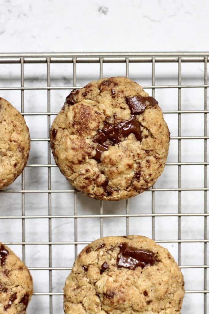image of baked chocolate chunk cookies, cooling on a rack