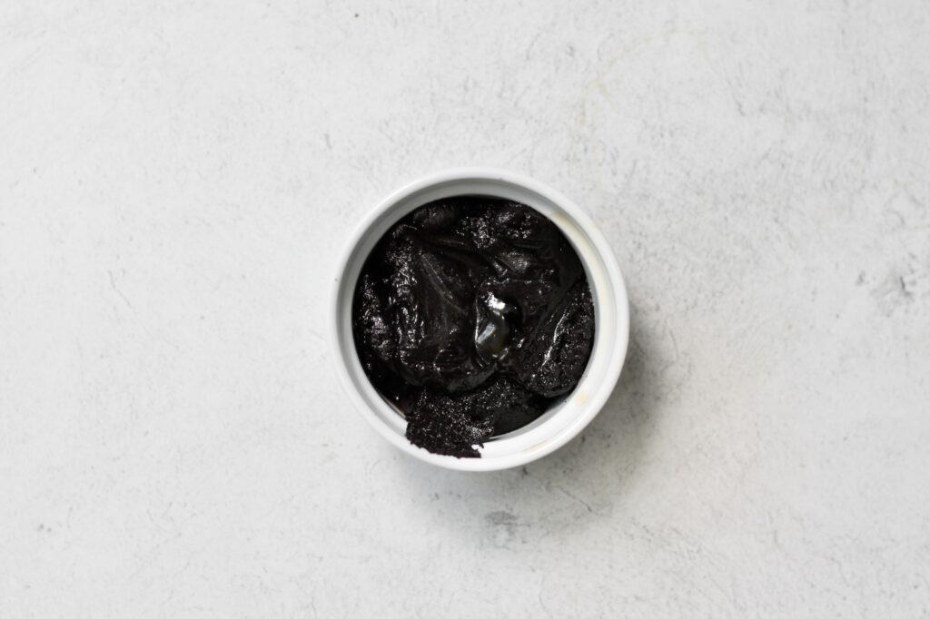 ramekin with melted black frosting