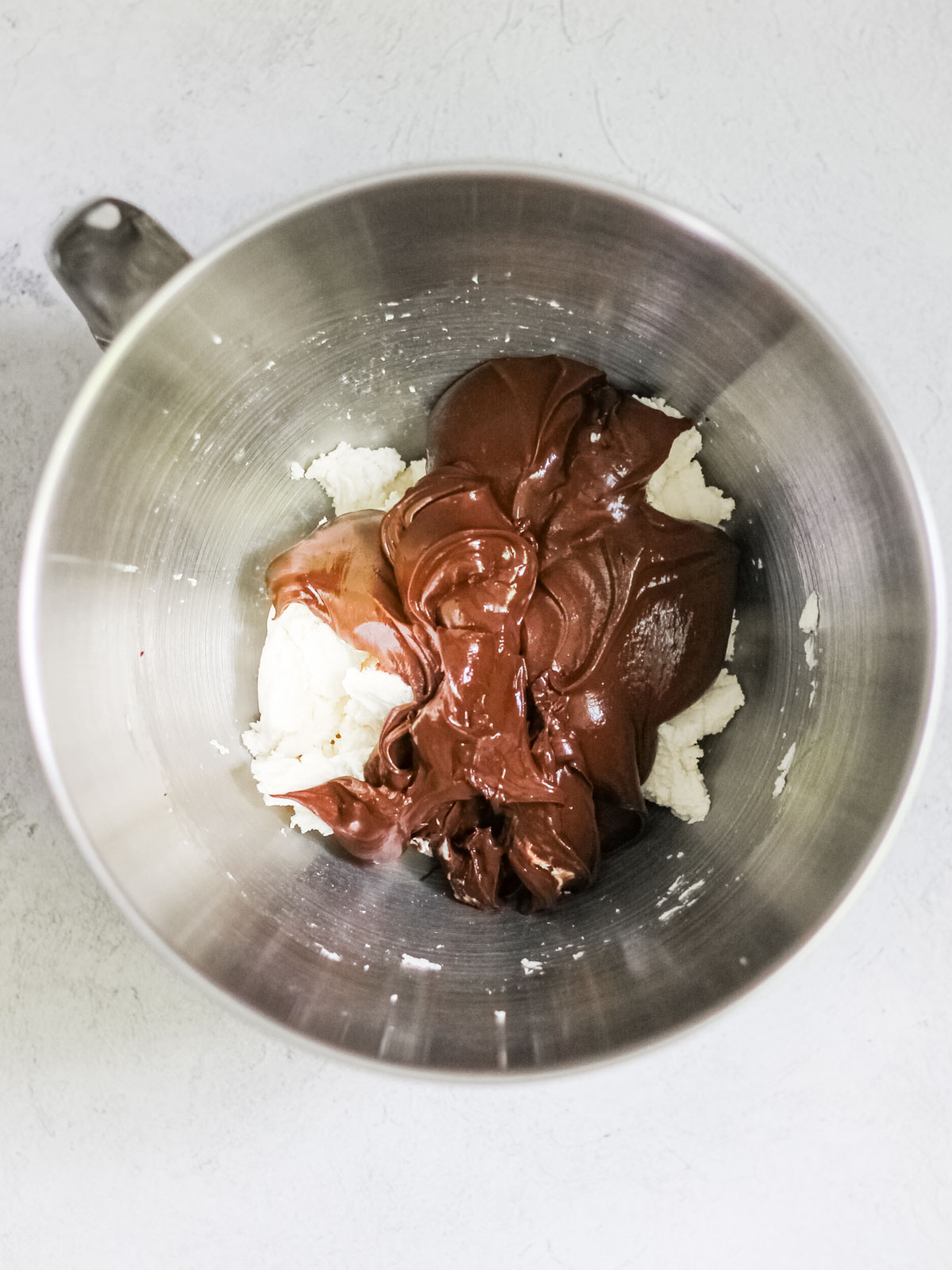 Mixing bowl with ingredients for chocolate ganache.