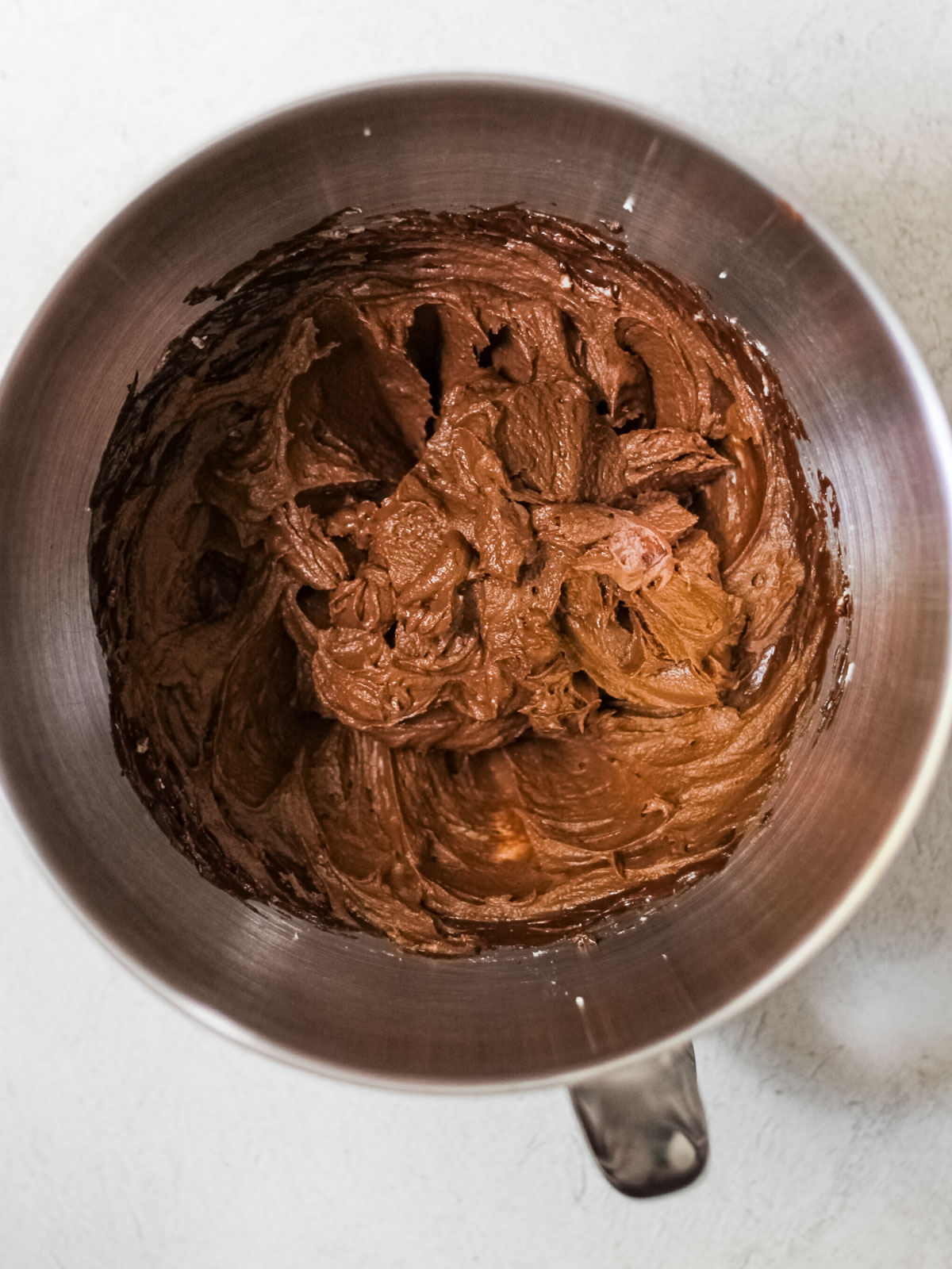 Mixing bowl filled with chocolate ganache.