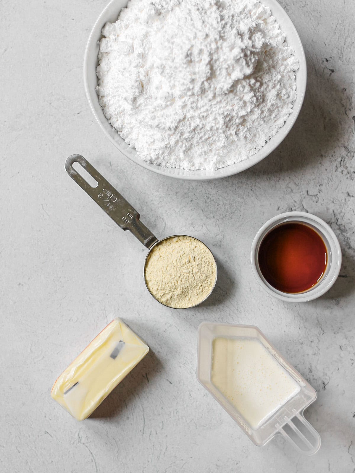 Overhead image of ingredients for mango buttercream.