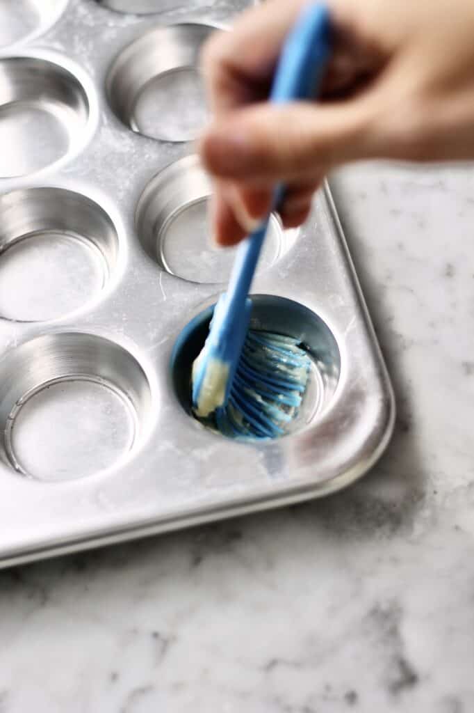 coating muffin pan with homemade baking release spray