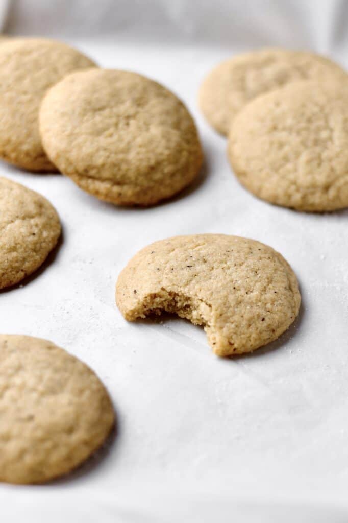 bite missing from a brown butter sugar cookie