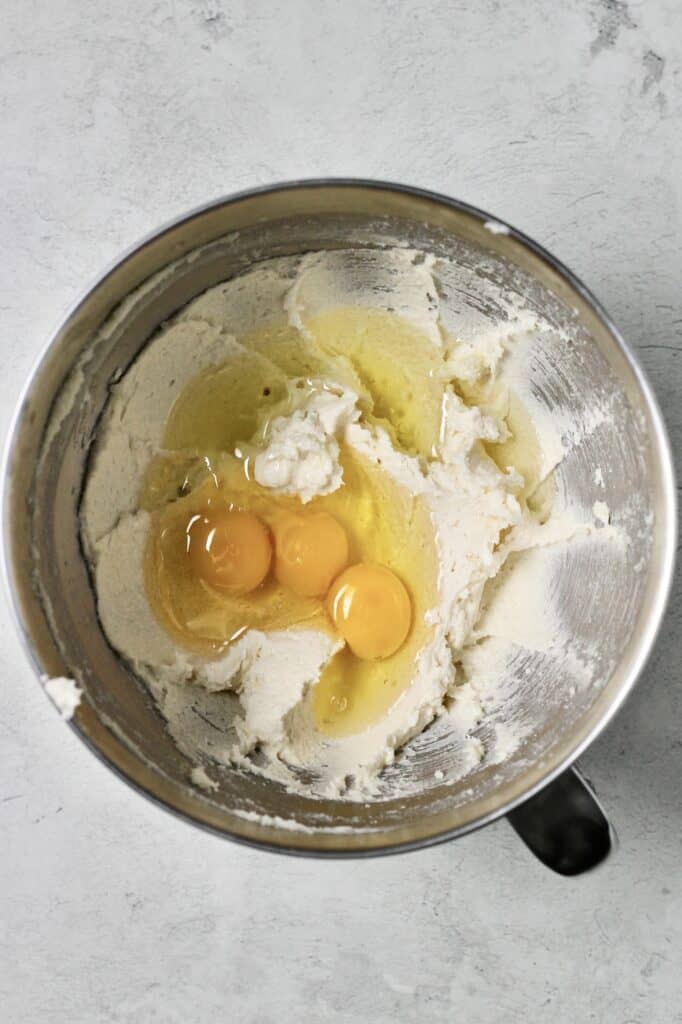 cake batter mixing bowl with eggs