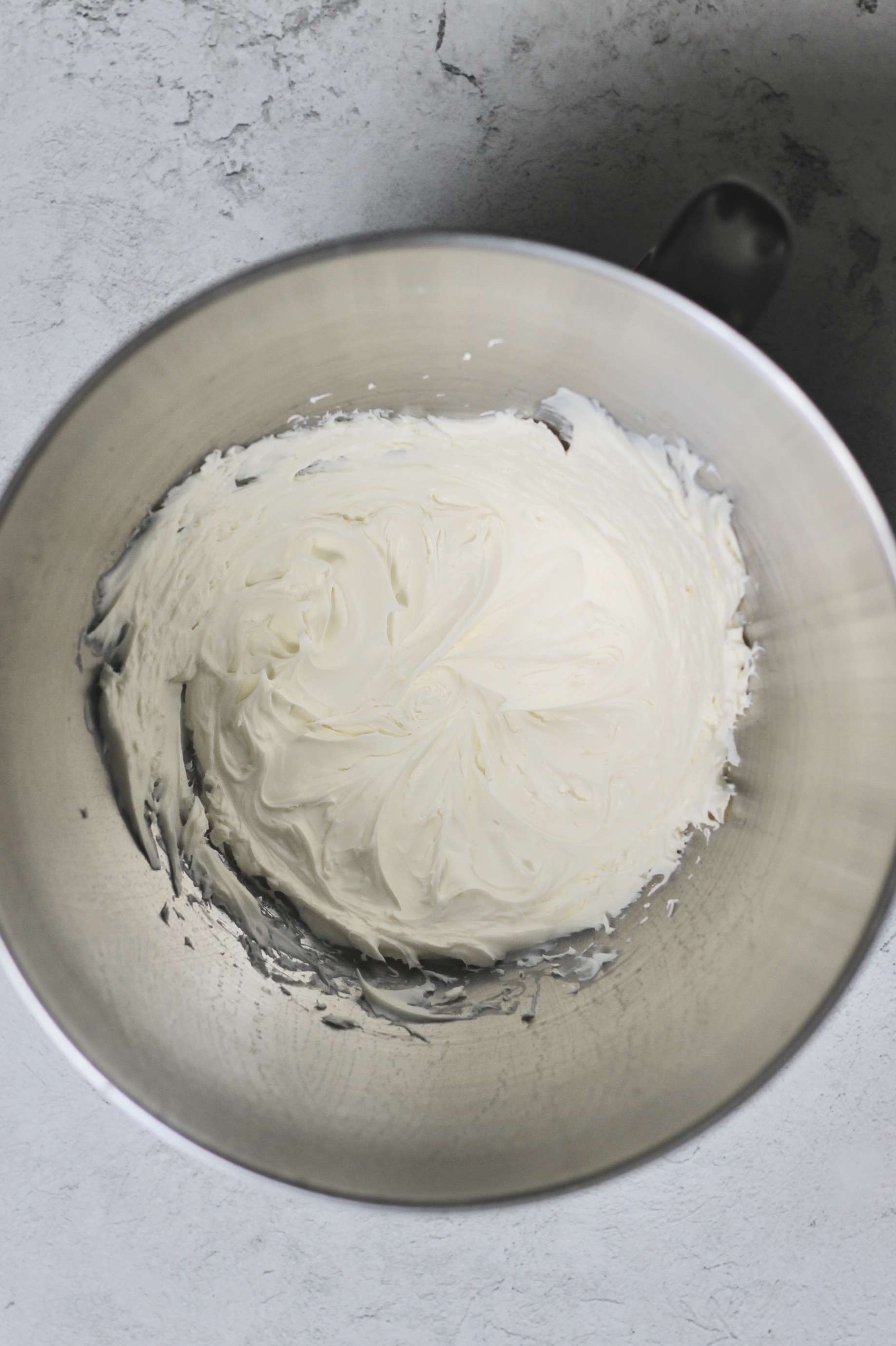 mixing bowl for mascarpone frosting ingredients before adding espresso powder