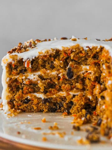Inside cross section of an old fashioned carrot cake made with pineapple and nuts.