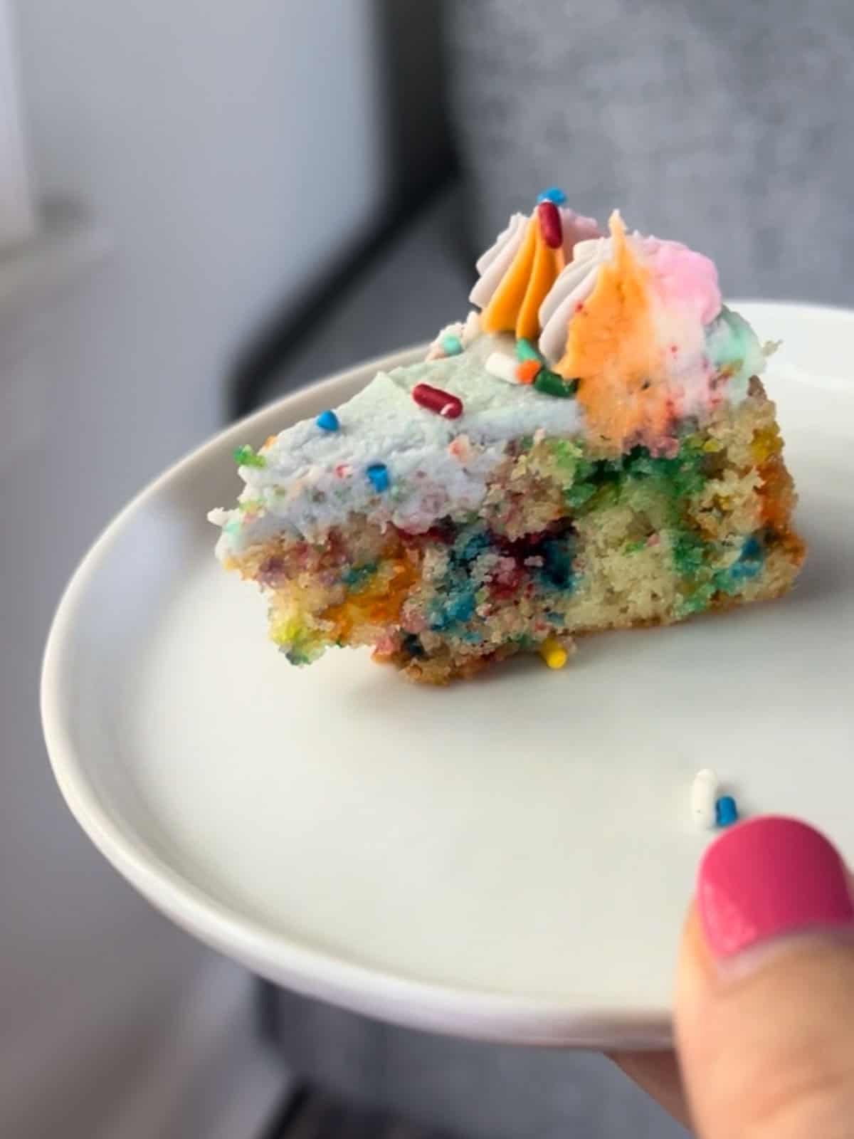 A tiny piece slice, cut from a one-layer, 4-inch cake.