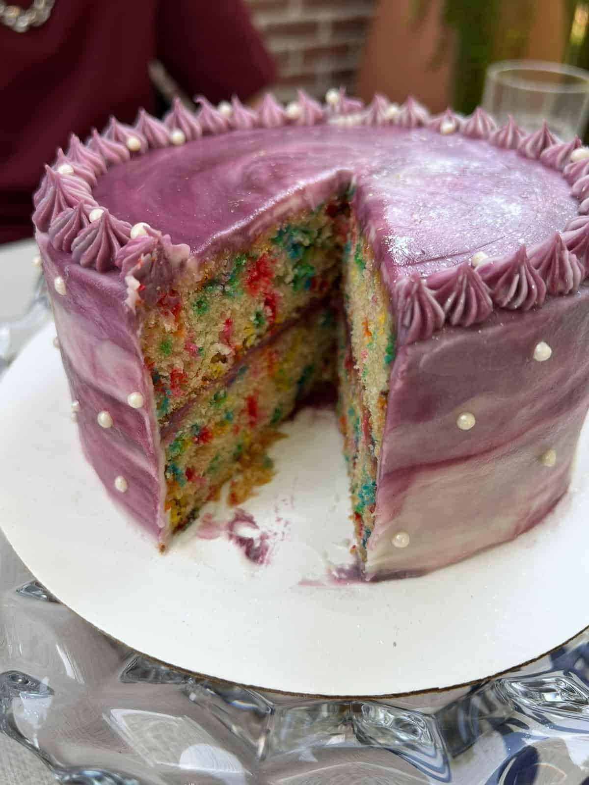 Inside of a purple and white marbled 6-inch cake, modified from the recipe for 4-inch cake to create a cake with different dimensions.