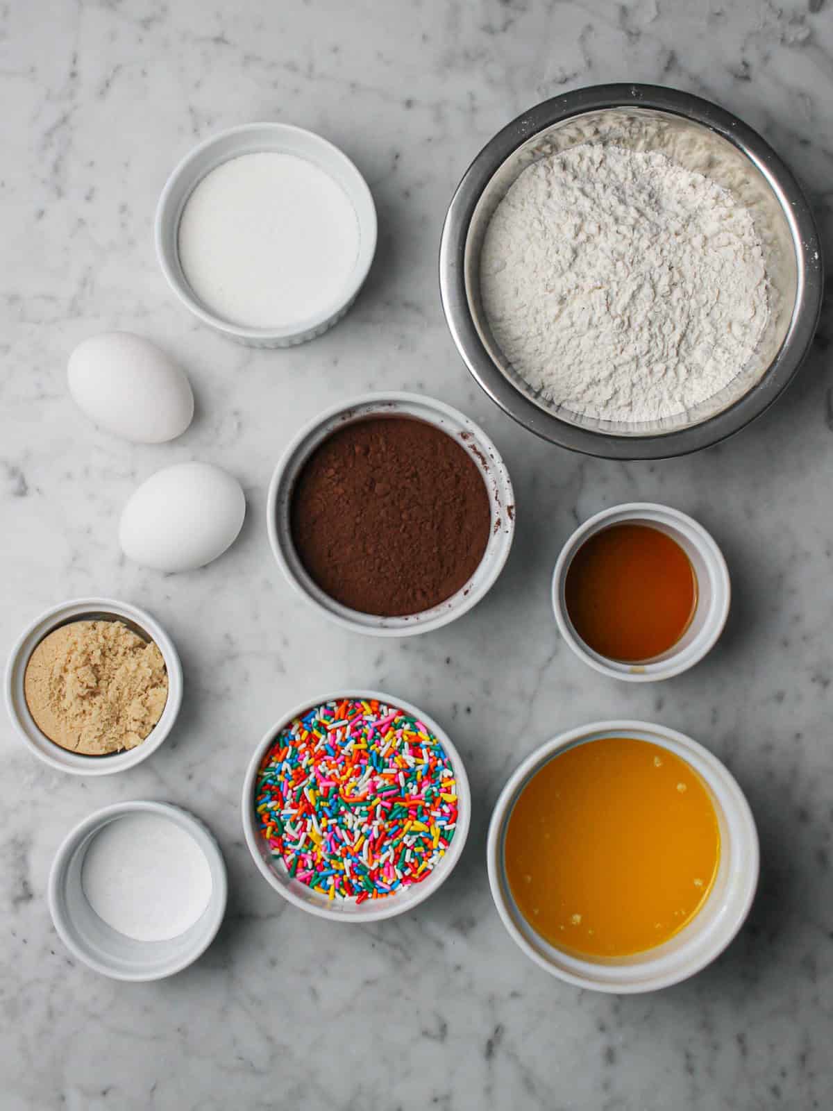 Ingredients for chocolate cookies with sprinkles.