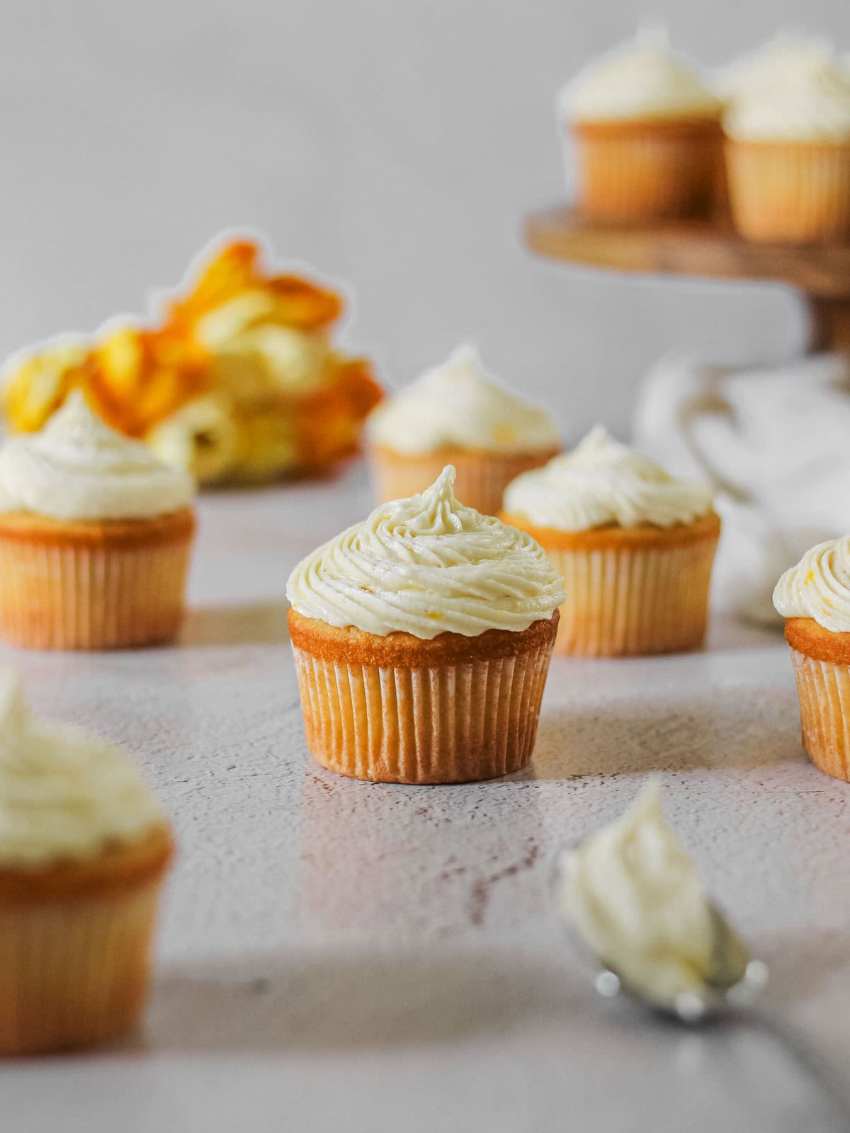 Mango-filled cupcakes topped with mango buttercream.