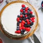Overhead image of no bake mascarpone cheesecake with berries on top.