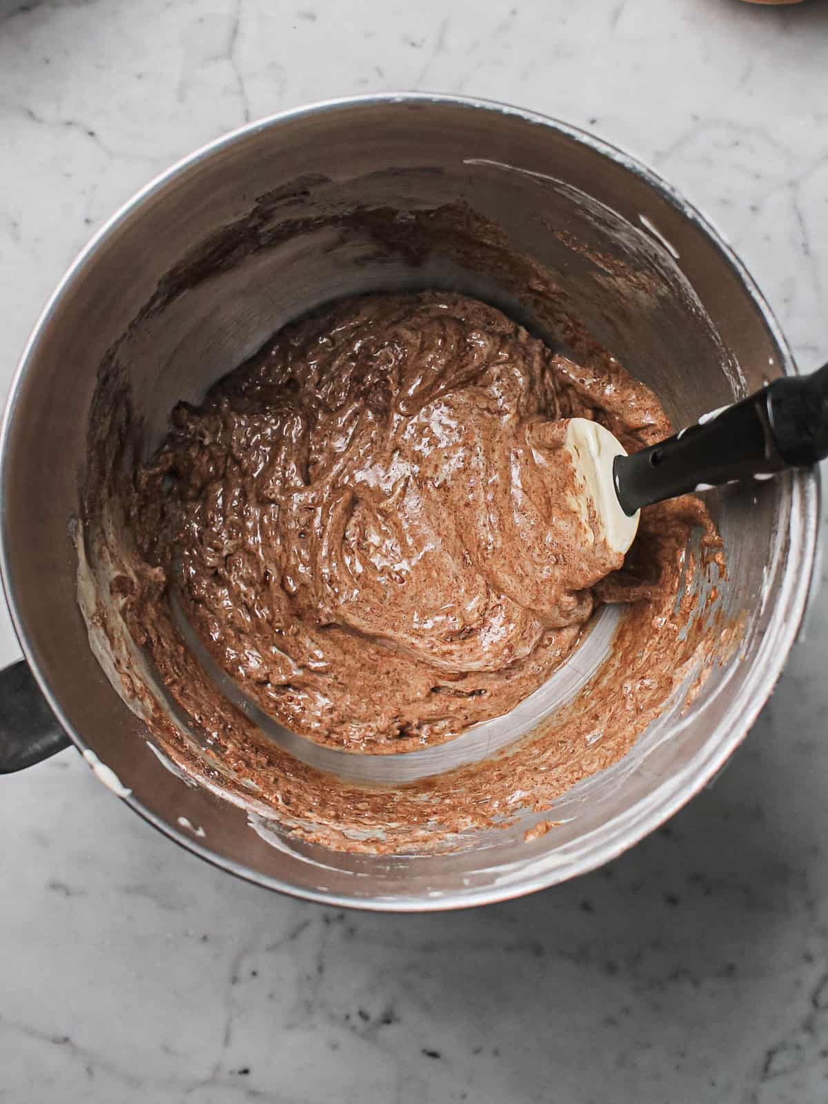 Chocolate sponge batter in a mixing bowl.