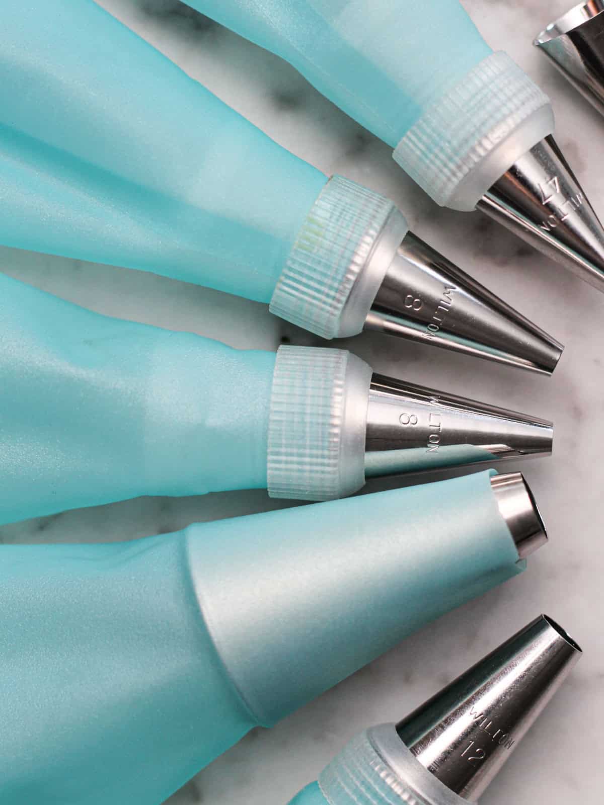 Up-close shot of piping bags and tips.