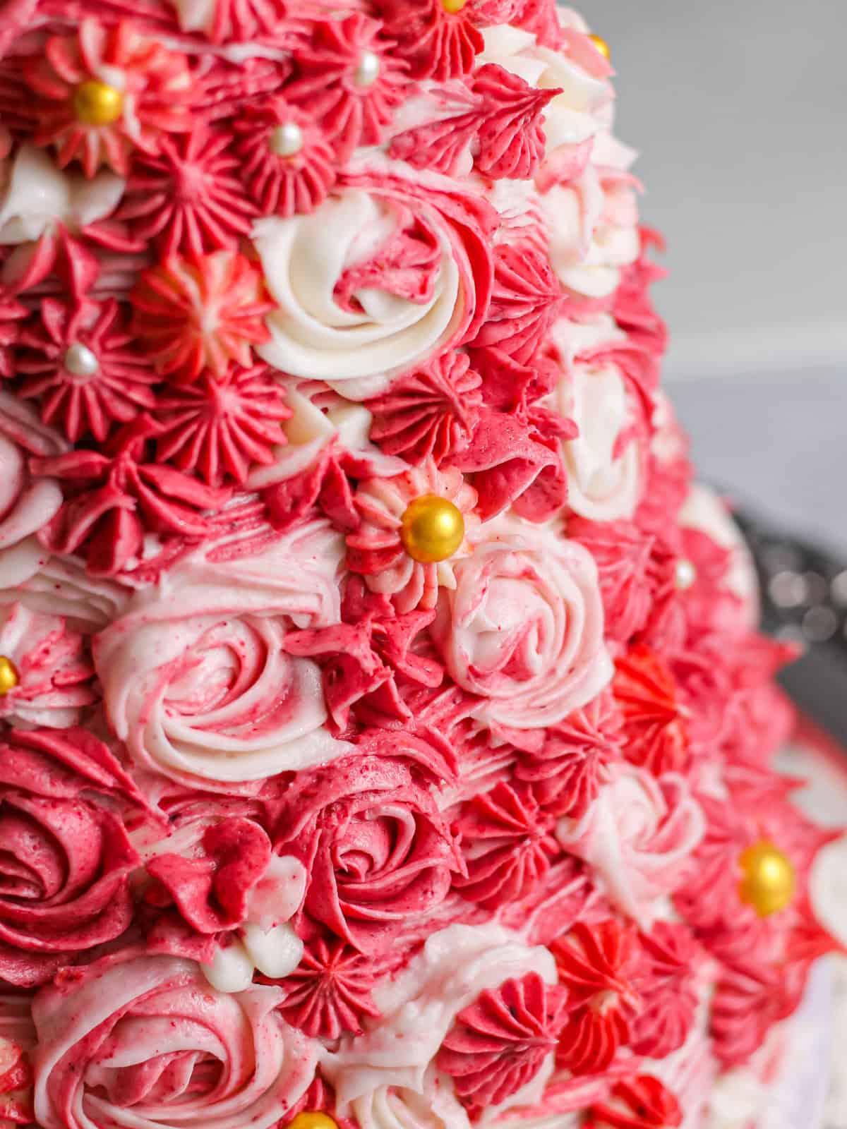 Up close image of the swirls on a Pink 3D Christmas Tree Cake.