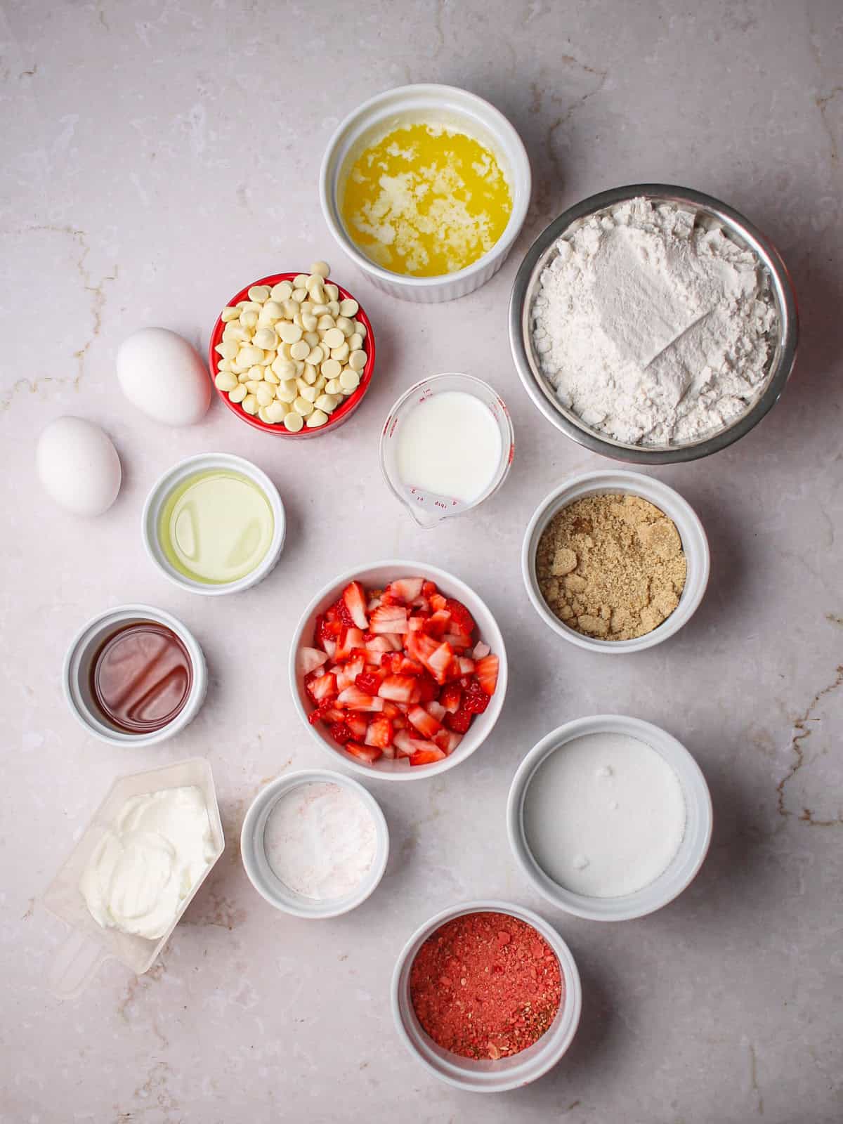 Ingredient shot for white chocolate and strawberry muffins.