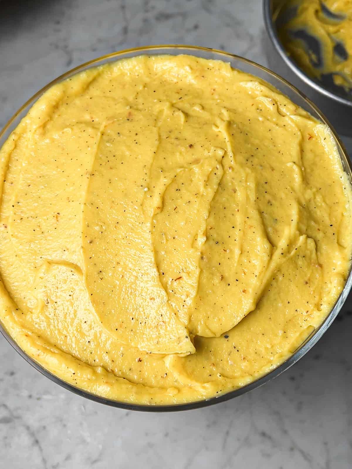 Saffron phirni in trifle dish.