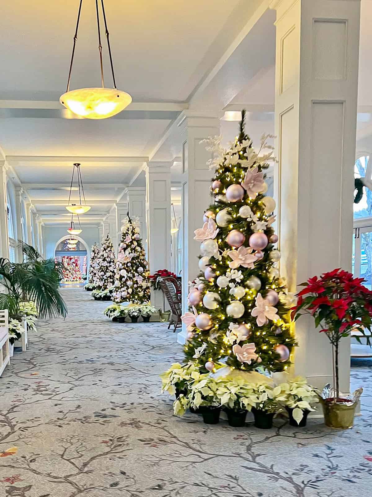 Photos from the Homestead's Christmas trees that inspired our pink 3D Christmas tree cake from episode two of Hallmark Channel's "Baked with Love: Holiday."