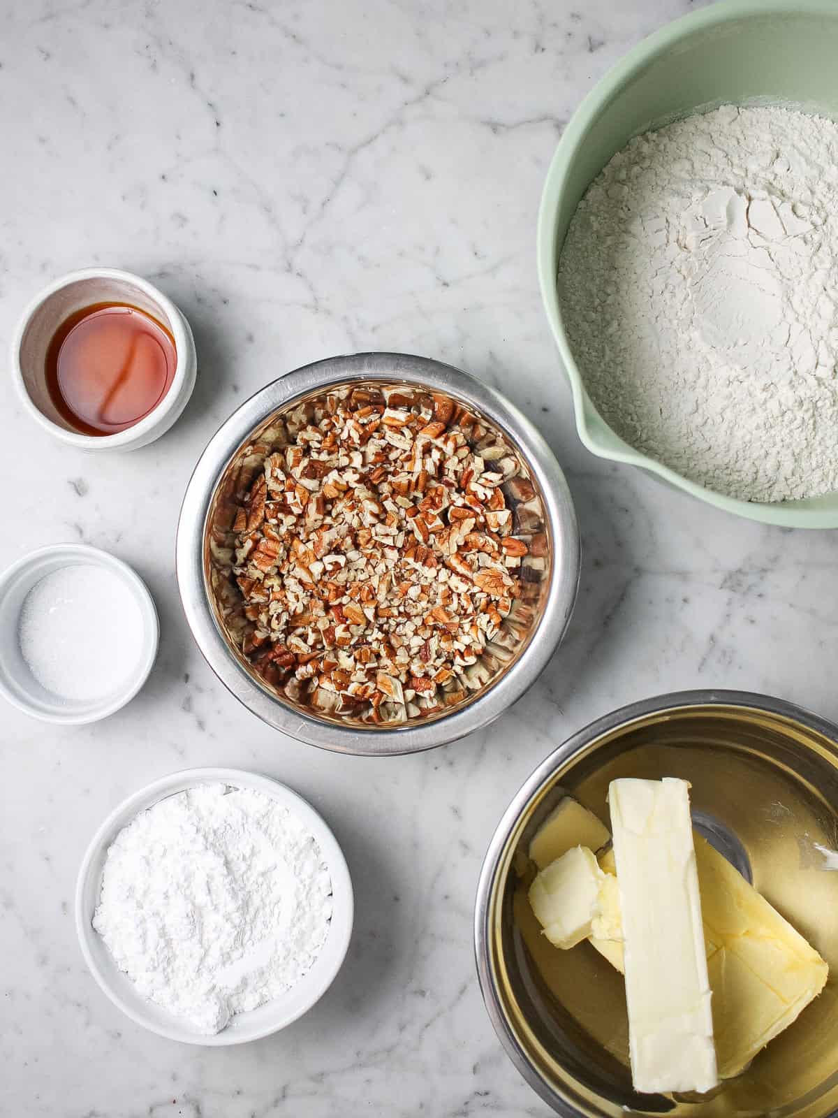 Overhead shot of ingredients for Russian tea cakes.