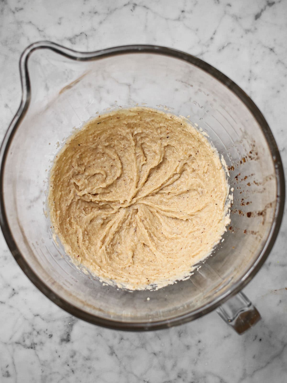 Cooled brown butter, creamed with sugars and vanilla in a mixing bowl.