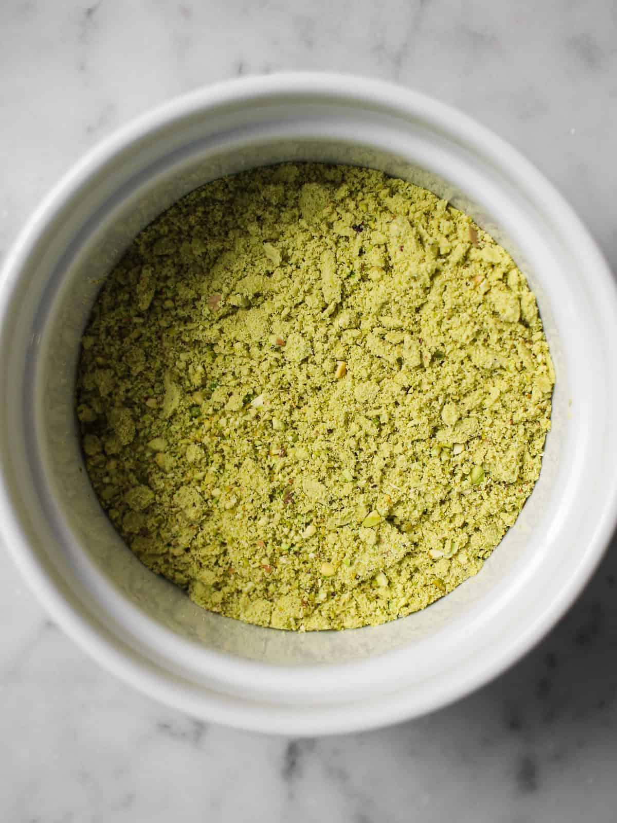 Pistachios ground into a fine meal.
